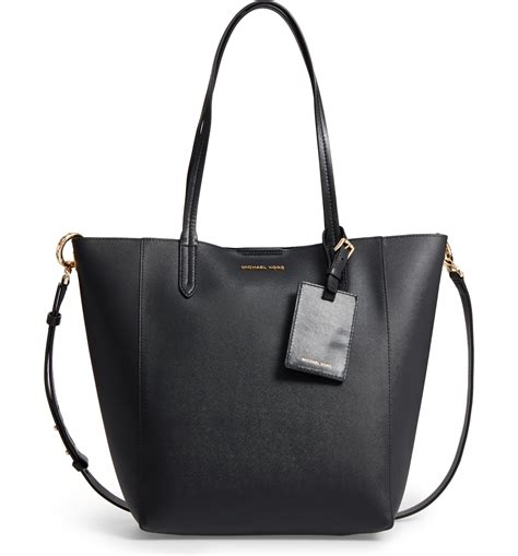 michael kors penny logo convertible tote|michael kors go bag.